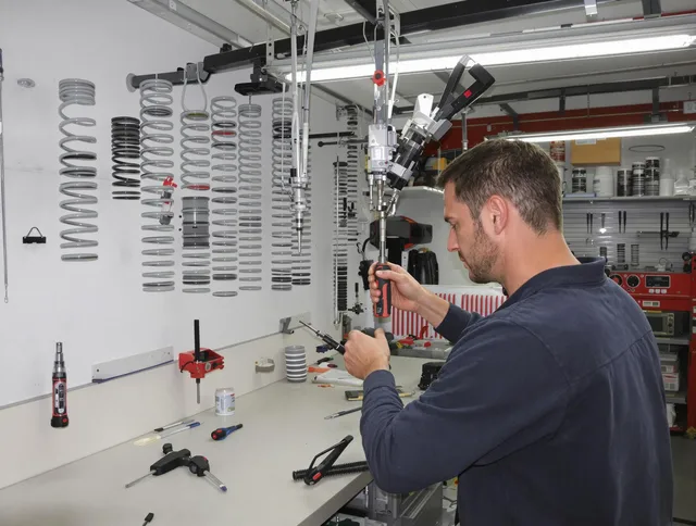 Medway Garage Door Repair safety certified technician performing precision spring replacement in Medway